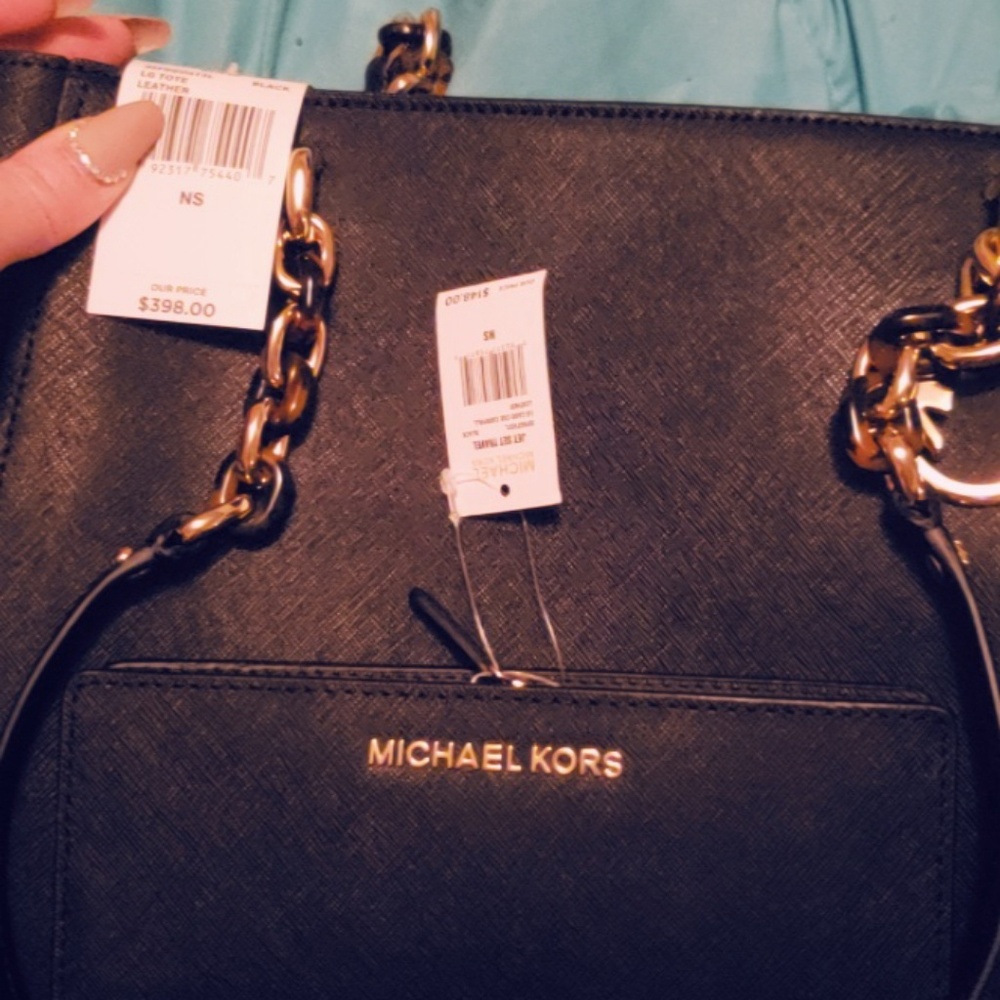 Mk purse new with tags has matching wallet w/tags